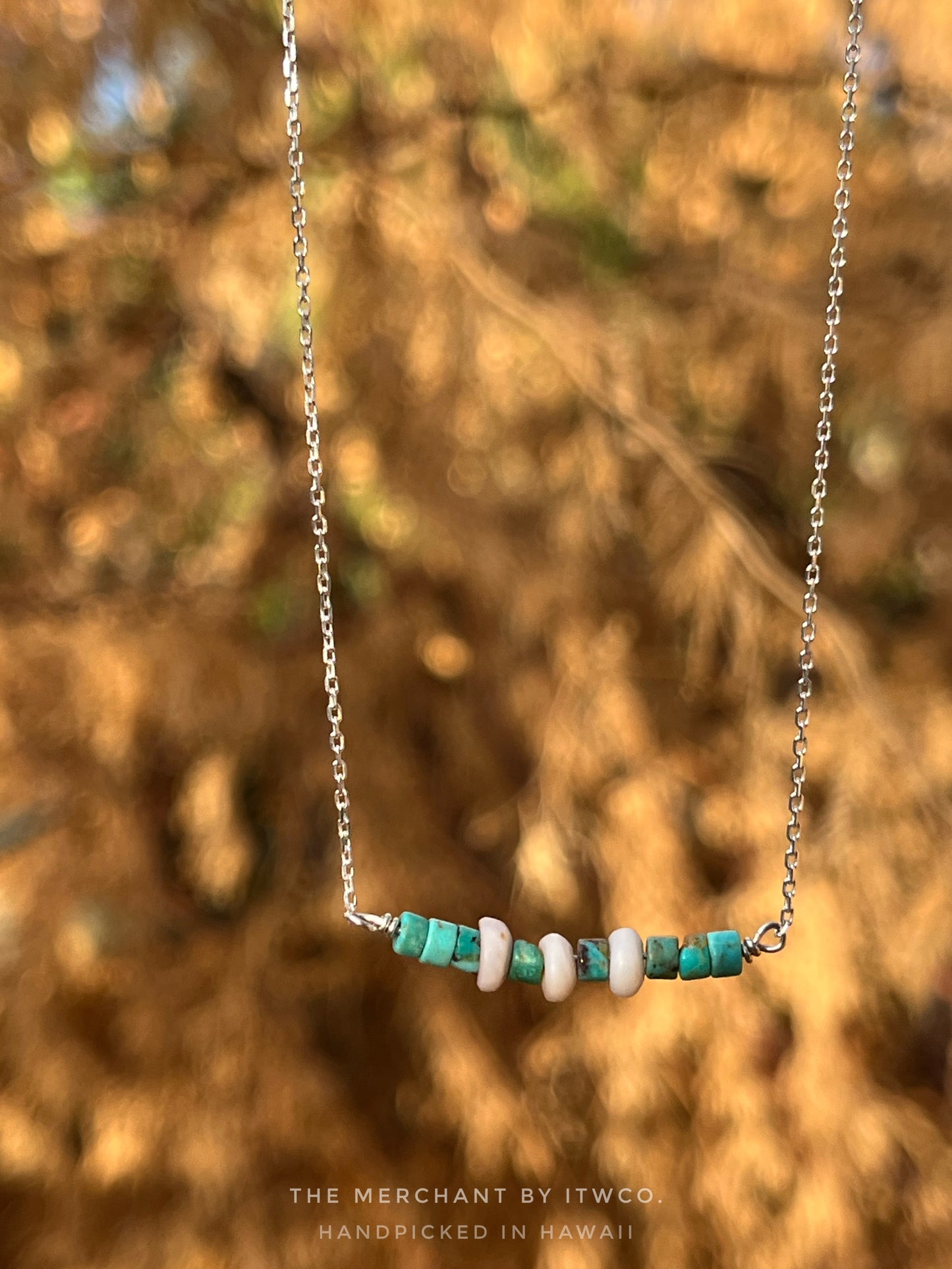 The Merchant Necklace in puka shell or herkimer diamond