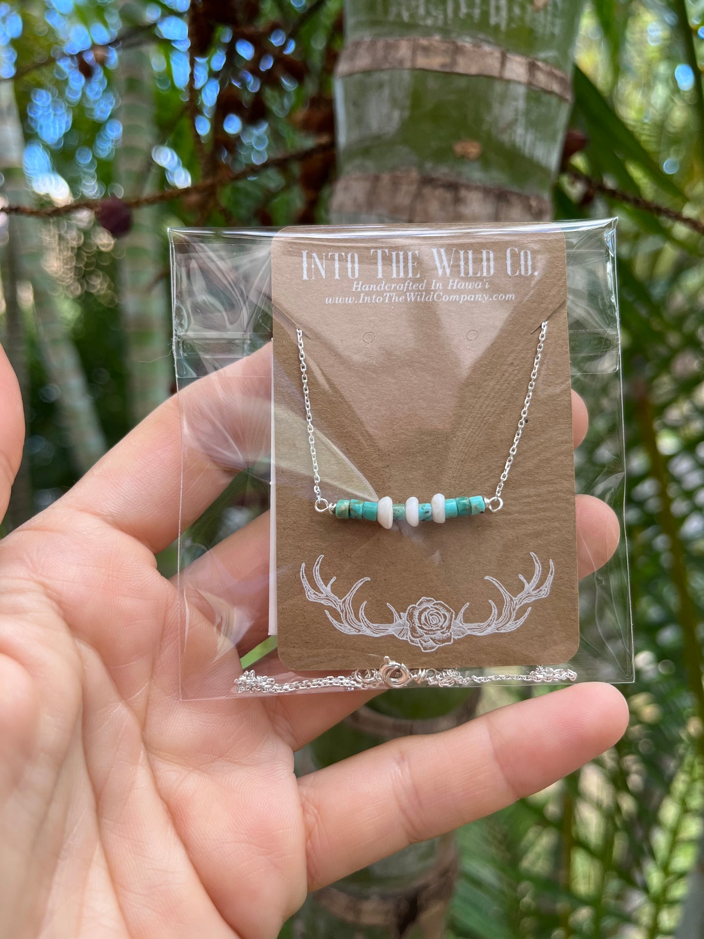 The Merchant Necklace in puka shell or herkimer diamond