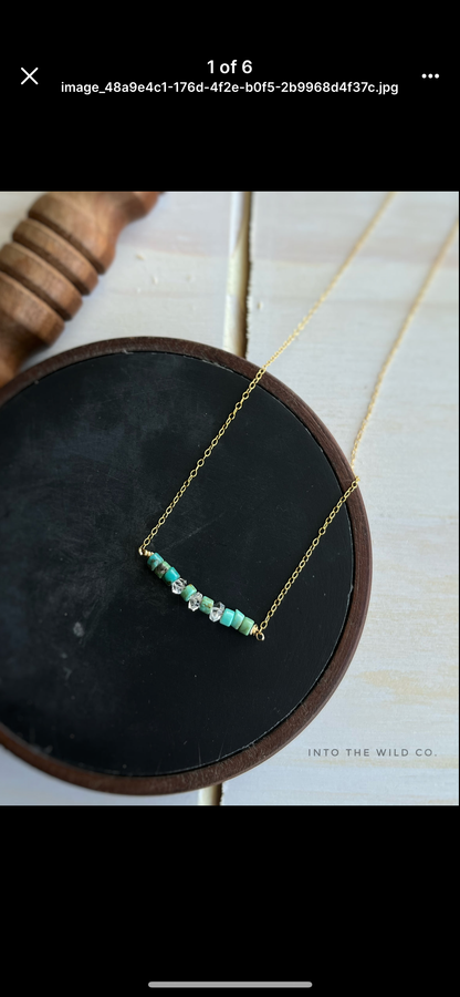 The Merchant Necklace in puka shell or herkimer diamond